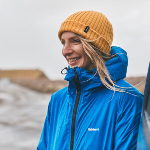 photo of author Easkey Britton, a white woman wearing a jacket and woollen hat